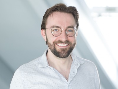 Portrait photo of Dr. Nils Bühler, media culture scholar